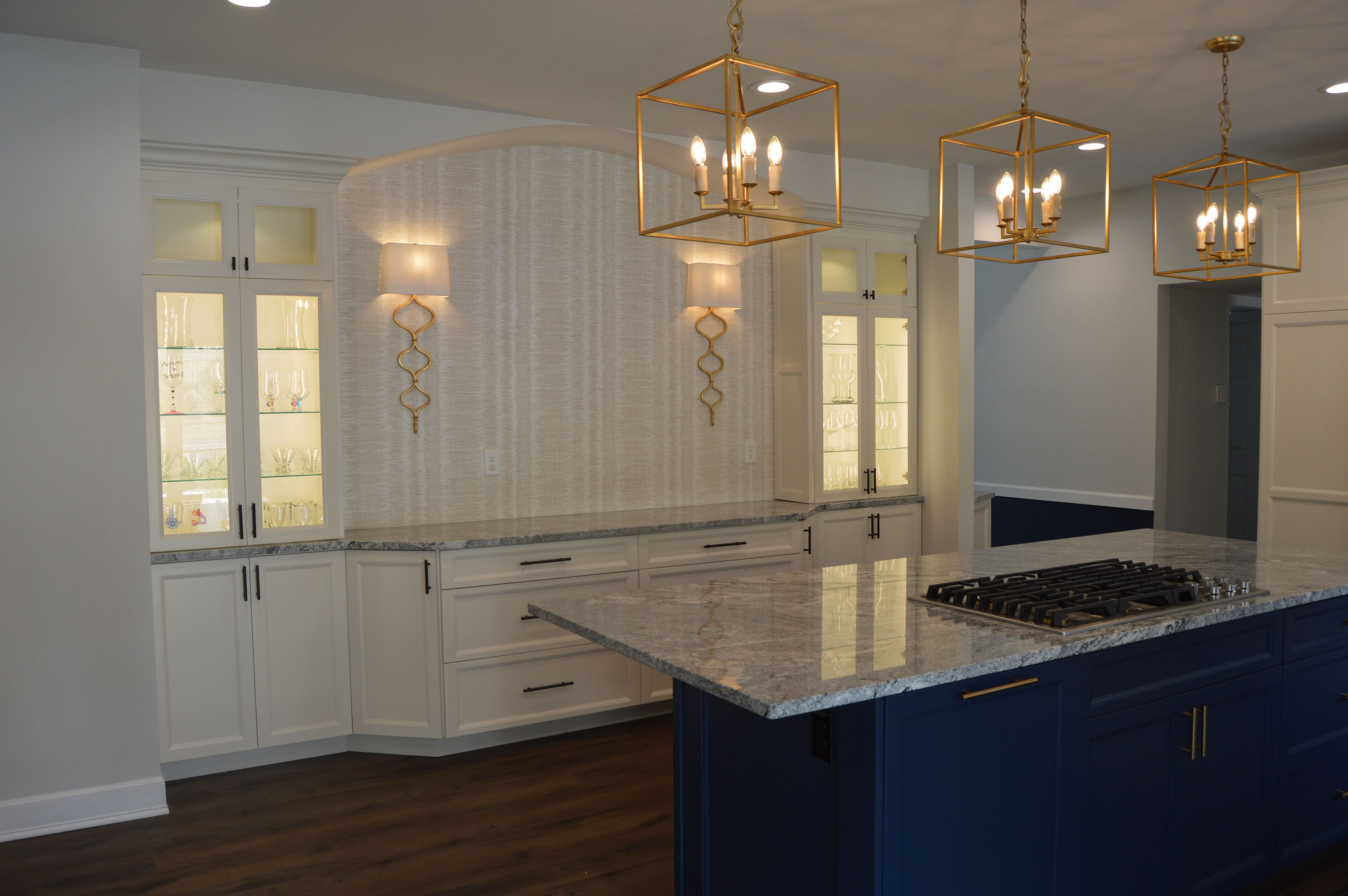Kitchen with striking blue island